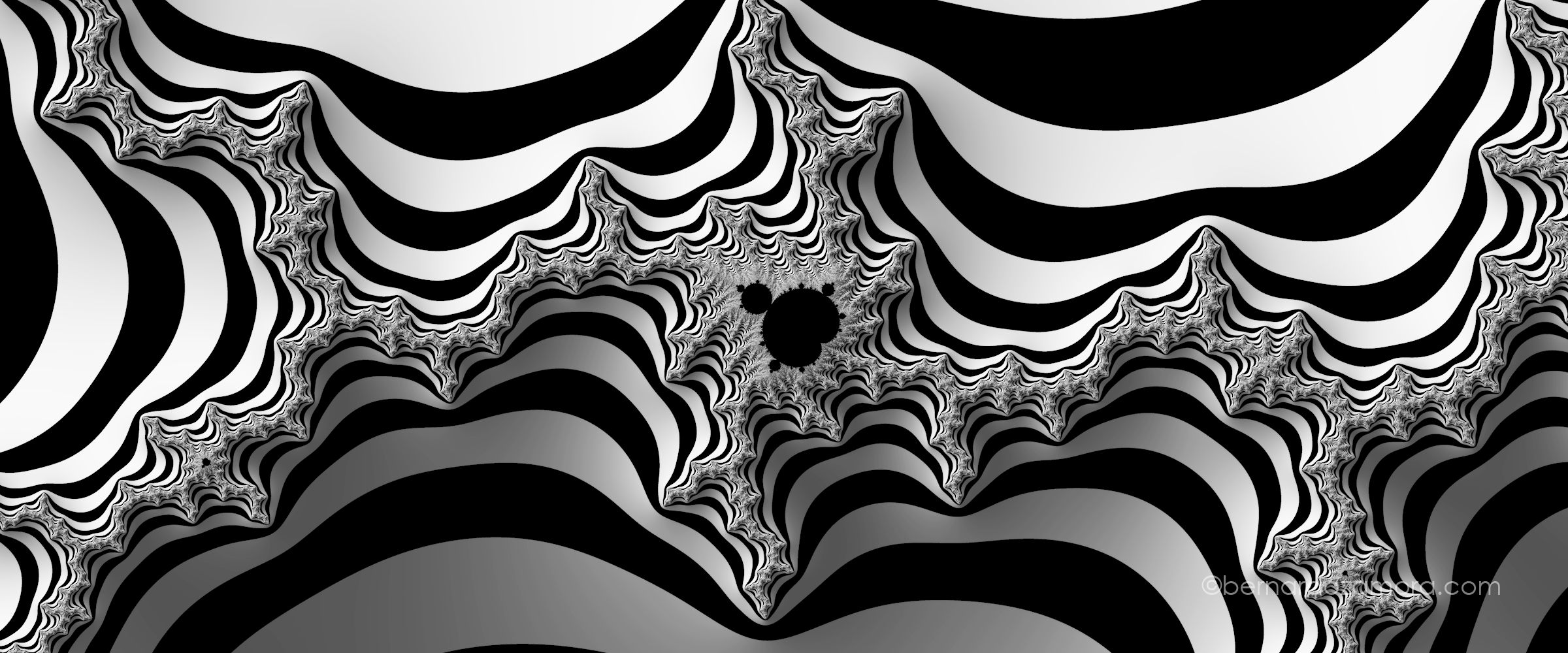 A high-resolution, monochrome zoom of the Mandelbrot set fractal. The image features a striking zebra-stripe aesthetic composed of alternating solid black and smooth, gradient-shaded white and gray undulating bars. A jagged, infinitely complex frontier waves horizontally across the center, revealing a microscopic, pitch-black cardioid silhouette of a mini Mandelbrot bulb nestled deep within the intricate, self-similar folds.